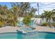 Backyard pool with spa, patio and landscaping at 4440 Yacht Club Dr, Venice, FL 34293