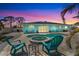 Private pool and spa surrounded by patio and seating provides a relaxing backyard oasis at 4440 Yacht Club Dr, Venice, FL 34293