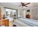 Comfortable bedroom with hardwood flooring leading into the connected living areas at 519 Bayview Ave, Osprey, FL 34229