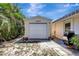 Backyard shed with roll-up door, perfect for storage at 519 Bayview Ave, Osprey, FL 34229