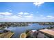 A stunning aerial view of waterfront homes with boat docks in a beautiful community at 5502 Tidewater Preserve Blvd, Bradenton, FL 34208