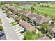 A high angle showcasing the residences surrounded by the golf course and picturesque landscaping at 5528 Palmer Cir # 204, Lakewood Ranch, FL 34211