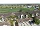 Community featuring lush landscaping, attached garages, and screened balconies at 5528 Palmer Cir # 204, Lakewood Ranch, FL 34211