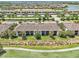 Beautiful aerial view of the community featuring lush landscaping and well-maintained condo buildings at 5528 Palmer Cir # 204, Lakewood Ranch, FL 34211