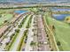 An aerial view showcasing the proximity to both the golf course and tranquil lakes at 5528 Palmer Cir # 204, Lakewood Ranch, FL 34211