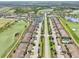Bird's eye view of the homes next to the golf course, tennis courts, and other community amenities at 5528 Palmer Cir # 204, Lakewood Ranch, FL 34211
