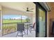 Balcony with comfortable seating, offering picturesque views of the golf course at 5528 Palmer Cir # 204, Lakewood Ranch, FL 34211