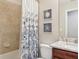 Bathroom features shower-tub combination, and vanity with marble countertop at 5528 Palmer Cir # 204, Lakewood Ranch, FL 34211