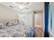 Cozy bedroom with plush bed, fan, closet and access to en-suite bathroom at 5528 Palmer Cir # 204, Lakewood Ranch, FL 34211