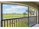 Enjoy relaxing on the spacious lanai with beautiful views of the lush green golf course at 5528 Palmer Cir # 204, Lakewood Ranch, FL 34211