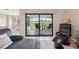 Relaxing patio with golf course view, seating and access from inside with sliding glass doors at 5528 Palmer Cir # 204, Lakewood Ranch, FL 34211