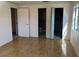 Bedroom with two entryways, allowing access to en suite bathroom at 5970 80Th N St # 101, St Petersburg, FL 33709