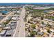 Expansive aerial view showcasing the neighborhood and proximity to the coast at 6009 Lords Ave, Sarasota, FL 34231