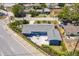 Aerial view of house showcasing an expansive patio with comfortable outdoor seating at 6009 Lords Ave, Sarasota, FL 34231