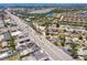 A high-definition aerial shot displaying the location and street access at 6009 Lords Ave, Sarasota, FL 34231