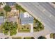 High angle shot features backyard patio, landscaped garden, and overall property layout at 6009 Lords Ave, Sarasota, FL 34231