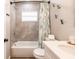 Stylish bathroom featuring tub and shower combination at 6009 Lords Ave, Sarasota, FL 34231