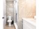 Modern bathroom featuring a shower and stylish vanity at 6009 Lords Ave, Sarasota, FL 34231