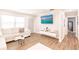 Bright living area showcasing wood flooring and a stylish, cozy atmosphere at 6009 Lords Ave, Sarasota, FL 34231