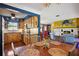 View of kitchen, dining, and living room areas at 610 Poinsettia Rd, Nokomis, FL 34275