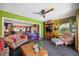 Cozy living room with hardwood floors and view into the kitchen at 610 Poinsettia Rd, Nokomis, FL 34275