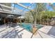 Beautiful pool and patio area enclosed with a screen, perfect for outdoor relaxation and entertainment at 610 Poinsettia Rd, Nokomis, FL 34275