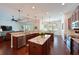 Gourmet kitchen with a large island, granite countertops, stainless appliances and a breakfast bar at 6316 Foxbrook Trl, Parrish, FL 34219
