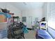 View of cluttered storage area with door to outside at 6316 Foxbrook Trl, Parrish, FL 34219