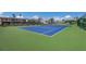 Enjoy an active lifestyle with the community's well-maintained blue tennis court, a perfect amenity for residents at 6400 Flotilla Dr # 87, Holmes Beach, FL 34217