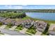 Gorgeous lakefront properties with tile roofs, well-manicured lawns, and inviting driveways at 6535 Clairborne Ln, Bradenton, FL 34211