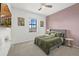 Cozy bedroom featuring a serene color palette, plush bedding, and ample natural light at 6535 Clairborne Ln, Bradenton, FL 34211