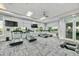 Fitness center with modern treadmills and TV screens, providing an engaging workout experience at 6535 Clairborne Ln, Bradenton, FL 34211