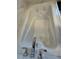 Close up of bathtub, with jets, with silver hardware and marble surround at 7322 34Th E Ct, Sarasota, FL 34243