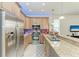 Bright and modern kitchen with stainless steel appliances and granite countertops at 7814 48Th E Ave, Bradenton, FL 34203