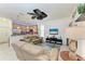 Open-concept design seamlessly connecting the living room to the modern kitchen at 7814 48Th E Ave, Bradenton, FL 34203