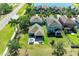 Aerial view featuring backyard with patio, hot tub, and green space at 8243 Nandina Dr, Sarasota, FL 34240