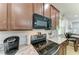 Well-equipped kitchen with modern appliances, ample counter space, and contemporary finishes at 8243 Nandina Dr, Sarasota, FL 34240