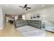 Spacious living room featuring a leather sectional, open layout, and lots of natural light at 8243 Nandina Dr, Sarasota, FL 34240