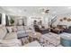 Spacious living room with an open floor plan, neutral tones, and plenty of natural light at 8346 Abalone Loop, Parrish, FL 34219