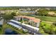 Beautiful condo community showcasing a golf course, pond and manicured lawns at 9630 Club South Cir # 6201, Sarasota, FL 34238