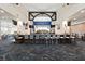 Full bar with ample seating and modern lighting, perfect for socializing and enjoying drinks at 9630 Club South Cir # 6201, Sarasota, FL 34238