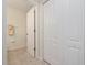 Neutral bathroom featuring tile flooring and white cabinets at 9630 Club South Cir # 6201, Sarasota, FL 34238