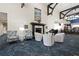 Inviting lobby featuring comfortable seating, a fireplace, and elegant decor for a welcoming atmosphere at 9630 Club South Cir # 6201, Sarasota, FL 34238
