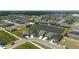 Aerial view of home showcasing water view, neighborhood amenities, and proximity to neighborhood streets at 11869 Richmond Trl, Parrish, FL 34219