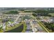 This aerial view shows a well-planned residential community with ponds and landscaped properties at 11869 Richmond Trl, Parrish, FL 34219