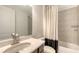 Bathroom features a toilet, bathtub, and a sink at 11869 Richmond Trl, Parrish, FL 34219