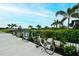 A row of bikes along a walkway in a well maintained community offer a fun way to experience the outdoors at 11869 Richmond Trl, Parrish, FL 34219