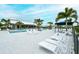 A resort style pool with plenty of seating and lounge chairs make this a great place to unwind at 11869 Richmond Trl, Parrish, FL 34219