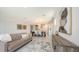 A well-lit living room showcases contemporary design and open floor plan at 11869 Richmond Trl, Parrish, FL 34219
