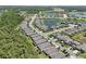 Aerial view of the lakeside community showcasing tree-lined streets at 14514 20Th E St, Parrish, FL 34219